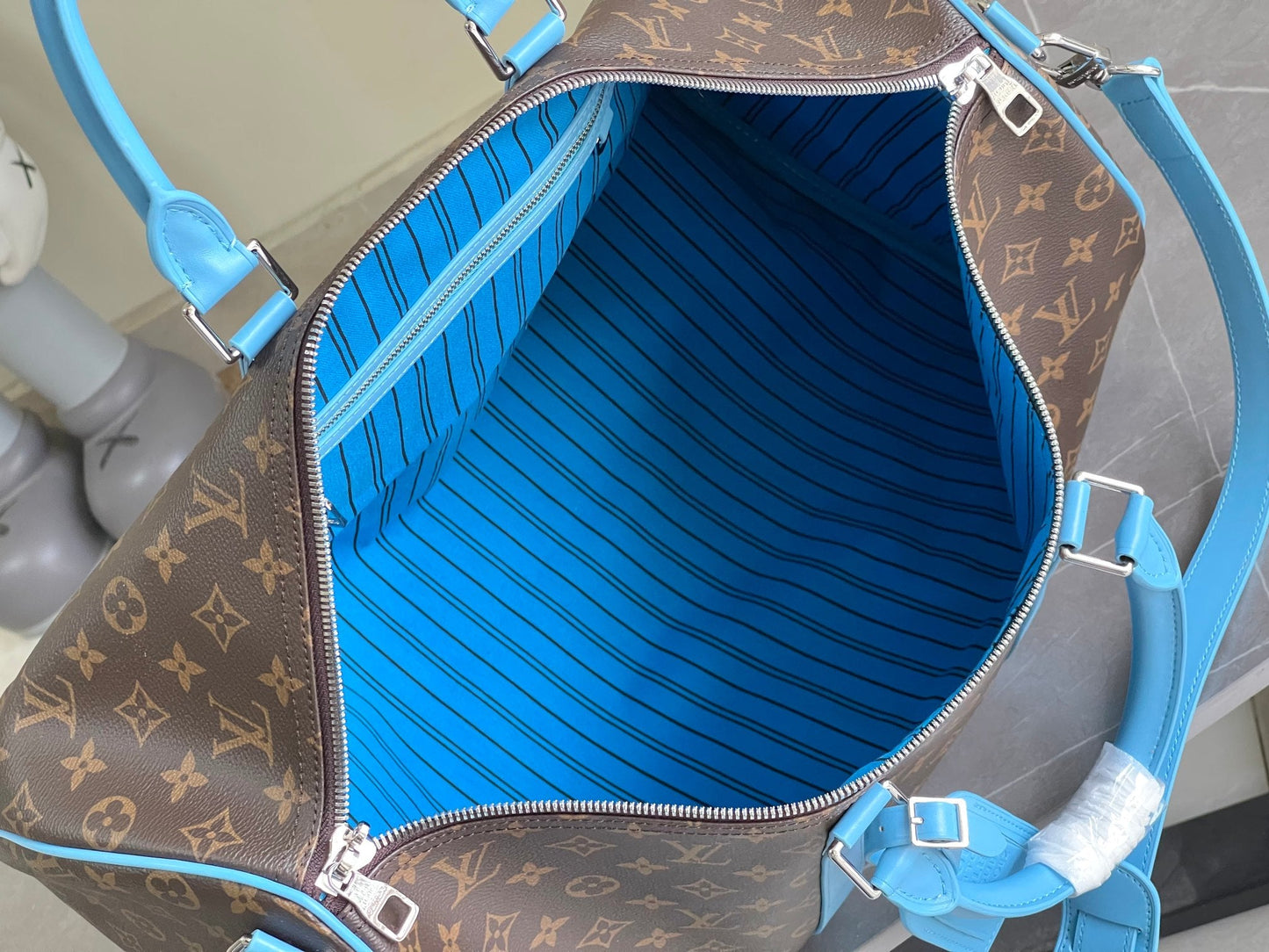 Keepall Bandoulière 50 – Monogram Canvas with Sky Blue Leather Trim